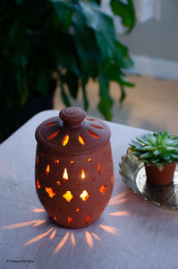 Tara Handmade Terracotta Candleholder with cutout pattern
